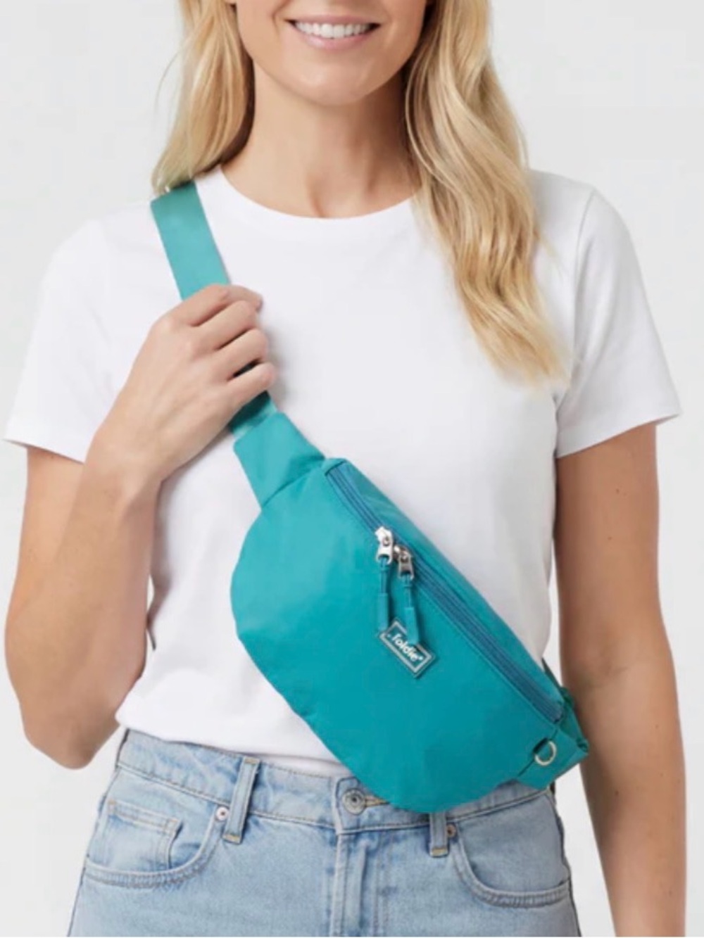 NWT the Foldie Teal Adjustable Crossbody/Fanny Pack